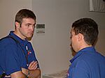 Roman and Dmitry. People wearing blue polo-shirts are part of the project admin team